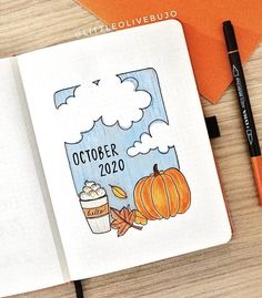 an open notebook with the words october on it