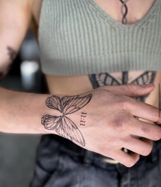 a woman's arm with a tattoo on it