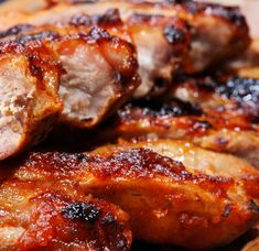 some meat is sitting on a cutting board