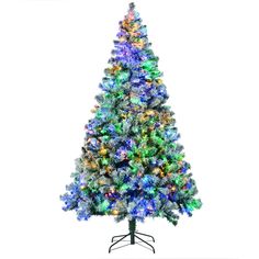 a christmas tree with multicolored lights is shown against a white background and has a black stand