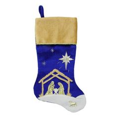 a christmas stocking with a nativity scene on it