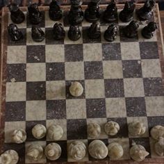 a chess board with several pieces on it