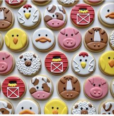 decorated cookies with farm animals and farm animals on them are displayed in front of a white background