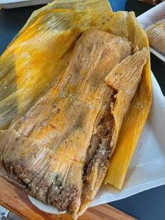 tamales on a plate ready to be eaten