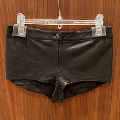 Chanel Mini Leather Shorts (Runway Collection) Chanel Black Soft Lambskin Leather Shorts Silk Lined. Color: Black Size: Fr 36 (Xs) French Sizing 36. Outer - 100% Lambskin Lining - 100% Silk Hardware - Silver Button Very Good Condition ***Do Not Bundle Listings Priced At $500 And Over - Sale Will Be Cancelled*** Fitted Short Leather Bottoms, Luxury Black Short Bottoms, Elegant Short Leather Bottoms, Fitted Black Leather Shorts, Luxury Bottoms For Night Out, Fitted Leather Shorts, Fitted Short Leather Pants, Fitted Luxury Shorts, Luxury Fitted Short Bottoms