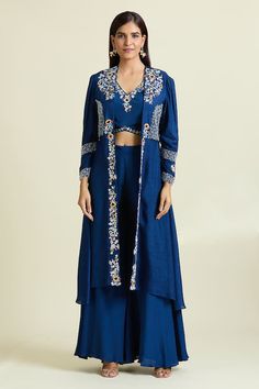 Blue jacket with crystal embellished, resham and dabka floral blossom motifs. Paired with padded embroidered blouse and palazzo. - Aza Fashions Blue Long Sleeve Outerwear With Intricate Embroidery, Blue Fitted Outerwear For Designer Wear, Fitted Blue Outerwear For Designer Wear, Blue Long Sleeve Outerwear With Zari Work, Blue Floral Embroidered Outerwear For Wedding, Elegant Blue Designer Outerwear, Elegant Blue Outerwear With Zari Work, Elegant Blue Outerwear With Intricate Embroidery, Blue Embroidered Outerwear For Party