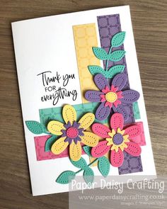 a handmade card with flowers on it