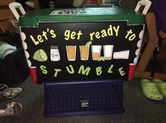 there is a cooler that says let's get ready to stumble on the floor