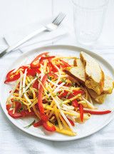 a white plate topped with bread and veggies