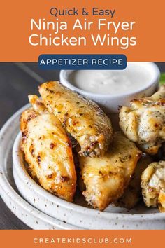 chicken wings in a white bowl with ranch dressing on the side and text overlay reading quick & easy ninja air fryer chicken wings appetizer recipe