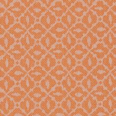 an orange and white background with small circles on the fabric, which is very large