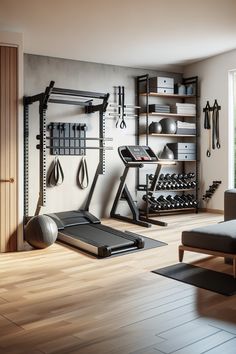 there is a gym with exercise equipment on the wall and hard wood flooring in front of it