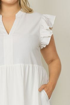 This Ruffled Pocket Tiered Midi Dress is perfect for any occasion! It's lightweight, has fun sleeves that are ruffled to perfection, and can easily be switched from casual to dressy. Forget a closet full of options-- this dress has you covered! This dress features a v-neck, placket, ruffled cap sleeves, pockets, is lined and has a tiered flowy midi silhouette. It's the perfect additional to your wardrobe. Small Bust 38" Length 44" : Medium Bust 40" Length 44" Large Bust 42" Length 44" : XL Bust Brunch Tiered Dress With Flutter Sleeve And Ruffle Hem, Brunch Flutter Sleeve Tiered Dress With Ruffle Hem, Flutter Sleeve Tiered Dress With Ruffle Hem For Brunch, Brunch Tiered Dress With Ruffle Sleeves, Flowy Tiered Dress With Ruffle Sleeves For Brunch, Spring Tiered Flutter Sleeve Dress With Ruffle Hem, Spring Tiered Dress With Ruffle Hem And Flutter Sleeves, Casual Tiered Dress With Flutter Sleeves And Ruffles, Casual Tiered Dress With Flutter Sleeves For Brunch