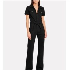 From Revolve 44% Cotton, 42% Lyocell, 13% Polyester, 1% Elastane Made In Turkey Machine Wash Front Zipper Closure Waist Tie Detail Front And Back Pockets Chic Straight Leg Denim Jumpsuit For Work, Chic High Rise Denim Jumpsuit For Work, High-waist Jumpsuits And Rompers For Work With Pockets, High Waist Jumpsuits And Rompers For Work With Pockets, Fitted Straight Leg Denim Jumpsuit For Work, Chic Denim Overall Jumpsuit For Work, Fitted Straight Leg Jumpsuits For Workwear, Chic High Rise Jumpsuits And Rompers For Work, Chic High Rise Jumpsuits For Workwear