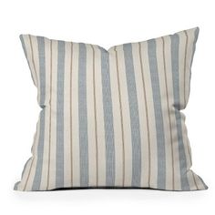 a blue and white striped pillow on a white background