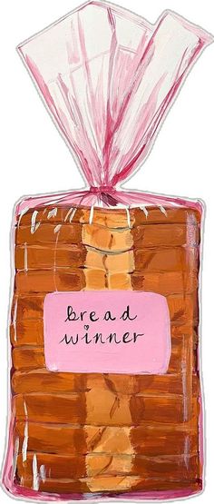 a piece of bread wrapped in plastic with the words bread winner written on it and pink ribbon