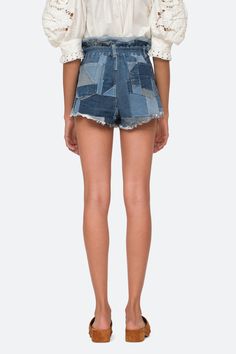 SEA Diego Denim Patched Shorts Composition: 100% cotton Color: Blue Fit: High Rise Black Witch Dress, Silk Spiderman, Catwoman Halloween Costume, Elegant Shorts, Combat Uniforms, Witch Dress, Cat Halloween Costume, Patchwork Denim, Denim Patches