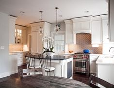 the kitchen is clean and ready to be used as a dining room or family room