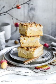 three pieces of cake sitting on top of a plate