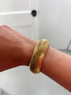 Bold, golden and sturdy bangle that will take your outfit to the next level. The She's Bold bracelet has been a crowd favorite, and we're thrilled to announce that a restock is on its way. Due to the demand, we encourage you to place a pre-order today to guarantee your spot in the upcoming shipment. 1” inch Wide Pairs well with She’s Bossy and She Is Golden Bracelets Water / Tarnish Resistant Gold plated over stainless steel Fits like a small/medium bracelet Trendy Gold Stretch Bangle Bracelet, Arabic Jewelry, Jewelry Photography, Cute Jewelry, Statement Jewelry, Jewelry Ideas, Next Level, Pre Order, 1 Inch