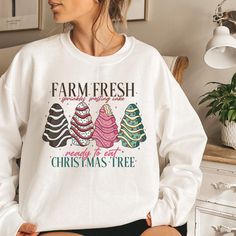 Farm Fresh Christmas Tree Shirt, Christmas Tree Cake Shirt, Christmas Tree Sweatshirt, Christmas Crewneck, Christmas Season, Christmas Gift WARNING -READ BEFORE ORDERING- REMEMBER: - The design is a Direct-to-Film (DTF) print. -You may refer to the size chart for precise measurements as all our sizes are unisex. There may be differences in sizes among brands. -Feel free to contact us if you have any issues about the things (sizes, shirt colors, design text colors, etc.). -Please be aware that we use different brands. Circle, Bella Canvas, Gildan Softstyle, Smart, Next Level, and Rustic United are a few examples. A few of these brands are comparable to one another. We are using other brands due to a scarcity of supply so that no orders are held back! -If you want sweatshirts and hoodies fro Christmas Tree Gift, Christmas Tree Png, Christmas Farm, Tree Cake, Tree Png, Christmas Tree Cake, Fresh Christmas Trees, Cute Christmas Tree, Christmas Tree Shirt