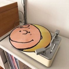 a record player sitting on top of a table