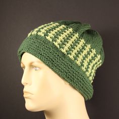 Hand-Knit Hat for man or woman is worked in a Three-and-One stitch to produce these nubbly Ribs in the accent color. The main color of this hat is a Medium Green and the accent is a Chartreuse Green. The wool hat has a snug fitting brim for winter warmth, the accent is knitted with both color yarns creating a double knit for added warmth.  This hat is one of a kind, and will look handsome with your winter coat or jacket. Size: X-Large to fit 24 to 26 inch circumference Fiber content:  100% Wool. Knit Hat For Men, Wool Hat Knit, Chartreuse Green, Hand Knit Hat, How To Look Handsome, Hat For Man, Double Knit, Green And Yellow, Wool Hat