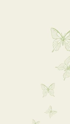 three butterflies flying in the air on a light green and white background with space for text