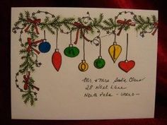 a christmas card with ornaments hanging from it