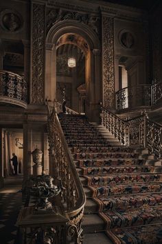 an ornate stair case in the middle of a building