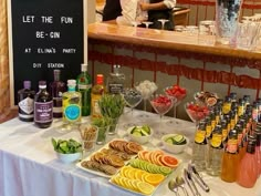 a buffet table filled with lots of food and drinks