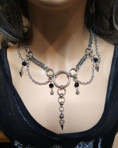 Handmade Stainless Steel Chunky Chain Gothic Edwardian style Choker Layered Necklace Set, a stunning piece of alternative punk fashion that will elevate any outfit with its bold and edgy look. This necklace features  strands of different chain styles and spikes, and it can be worn at various lengths due to the built-in extender. It runs from approximately 15 inches to 18 inches. it is all stainless steel so it is completely waterproof and will NEVER tarnish. The layered design of this necklace s Punk Metal Choker For Alternative Fashion, Silver Punk Jewelry For Cosplay, Edgy Metal Choker For Halloween, Metal Emo Choker For Alternative Fashion, Silver Gothic Choker For Cosplay, Edgy Metal Choker For Cosplay, Alternative Metal Choker For Cosplay, Silver Punk Necklace For Cosplay, Punk Silver Necklace For Cosplay