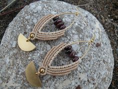 Garnet Macrame Earrings, Brass Marquise Half Moon Tribal Hippie Earrings, Beaded Bohemian Style Jewelry This statement hippie earrings are created using the macrame technique. It is made by a high quality tan waxed thread. Also, we use a Garnet chips beads and brass moon charms to complete design. Waxed thread gives the product durability and strength, and elegant natural appearance. It's a beautiful gift and a nice accessory what you can wear every day. Earrings characteristics: *Marquise brass Adjustable Teardrop Bohemian Wrap Earrings, Bohemian Teardrop Wrap Earrings, Adjustable Bohemian Beaded Wrap Earrings, Bohemian Drop Earrings In Natural Color, Bohemian Beaded Dangle Wrap Earrings, Adjustable Bohemian Brass Wrap Earrings, Bohemian Hand Wrapped Brown Earrings, Bohemian Brown Hand Wrapped Earrings, Bohemian Brown Hand-wrapped Earrings