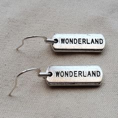 Silvertone Wonderland Earrings. New, Never Worn. Old Stock Earrings Color, Alice In Wonderland, Silver Tone, Jewelry Earrings, Women Jewelry, Silver, Women Shopping, Color