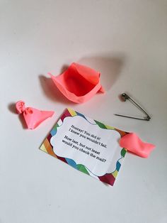 an origami bird and some scissors on a table with a card that says, happy birthday