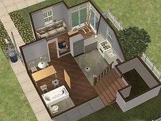 an aerial view of a house with the living room and kitchen