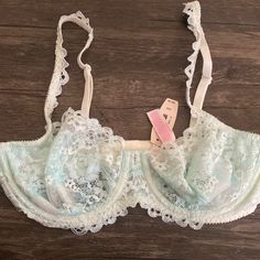 Beautiful Lace Bra By Victoria Secret! Tag Came Off Accidentally After Snapping Pics Will Include Tag When Purchased. 32d Unlined Back Closure Adjustable Straps Small Crystal Accent On Front Underwire Check Out Matching Panties In Closet! I To Discount Bundles! Check Out My Closet For Other Brands Like Victorias Secret, Pink, Bombshell, Lululemon, Bebe, Michael Kors , Swarovski, Balmain, Iso, Aldo, Louis Vuitton, Coach, Gucci, Lilly Pulitzer Fitted Lace Bra In Coquette Style, Fitted Lace Bra With Sheer Details, Fitted Lace Sheer Bra, Fitted Lace Coquette Bra, Coquette Fitted Lace Bra, Spring Sheer Fitted Bra, Underwire Bra Partially Lined For Spring, Partially Lined Underwire Bra For Spring, Sheer Feminine Fitted Bra