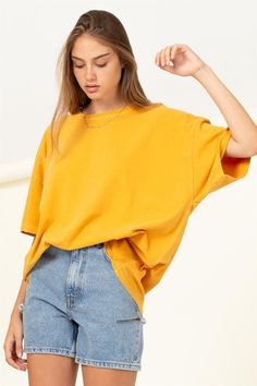 Chill in this cool and laid back, oversized t shirt that shapes a crew neckline, drop shoulders, and short sleeves over a wide cut bodice that extends into an oversized silhouette with a plain hem. Pair with a cute bottom to finish the look! 100% cotton imported. Designed in the usa model is 5' 9" tall, 32" chest, 23" waist and 35" hips and wearing a size S/M. Oversized Drop Shoulder Shirt, Cute Oversized Shirt Outfits, Loose T Shirt Outfit, Oversized T-shirt, Over Size T Shirt Outfit, Oversized T-shirts, Baggy Tshirt Outfit, Oversized T Shirt Outfit, Colorful T Shirt