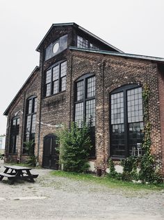 an old brick building with lots of windows