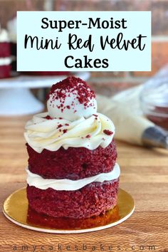 a red velvet cake with white frosting and sprinkles on a plate