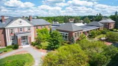 an aerial view of a campus with trees and buildings