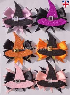 halloween hair bows with witch hats on them are ready to be put in the closet