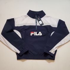 Fila Gigi 1/4 Zip Track Jacket Blue White Brand New With Tags!!! Size - Women's Small Blue Sports Tops With Pockets, Navy Casual Half-zip Outerwear, Navy Sporty Half-zip Top, Sporty Navy Half-zip Top, Navy Sporty Top With Pockets, Navy Long Sleeve Track Jacket For Spring, Fila Windbreaker, Graphic Jackets, Fila Jacket