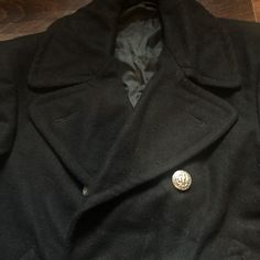 "Beautiful black military double button coat in excellent condition. Made very well, wool shell with lining. Beautiful silver anchor buttons. Tag removed, about size medium. Measurements below. 20\" armpit to armpit 15\"shoulder to shoulder 20.5\"sleeve 30\" collar to hem" Vintage Military, Very Well, Wool Jacket, Black Wool, Men's Polo Shirt, Polo Ralph Lauren, Jackets & Coats, Jackets For Women, Wool