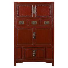 A Chinese Qing dynasty period red lacquer cabinet from the mid 19th century with drawers and doors. Created in China during the Qing Dynasty era, this cabinet features a linear silhouette perfectly complimented by a red lacquer finish. The upper section showcases two small doors with raised carved scrolling foliage motif, sitting above a row of three drawers fitted with bail handles on simple rectangular plates. Two pairs of double doors below of decreasing size, adorned with pear-shaped pulls, Asian Furniture, Large Cabinet, Carved Doors, Small Doors, Red Lacquer, Furniture For Sale, Cabinet Features, Qing Dynasty, Double Doors