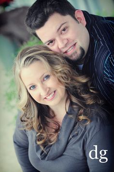 a man and woman posing for a photo