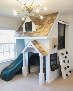 a dog house with a slide in the middle