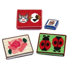 three coasters with different designs on them, one has a cat and the other has a flower