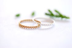 Gold Filled Beaded Ring, Gold Silver Stacking Ring, Hammered Bead Ring, Gold Dot Ring Midi Ring Gold Filled Flat Beaded Ring Minimalist Choose between our 14k gold filled or 925 Sterling Silver Hammered Beaded Ring. Perfect for your everyday look. Stack with other rings or wear it alone, these hammered rings are a great addition to your jewelry. - 2mm band width ☑ Quantity: 1 Ring ☑ Approximate Measurements: Please select your ring size ☑ Surface: Shiny Finish ☑ Material: Sterling Silver and 14k Minimalist White Beaded Rings, Minimalist Everyday Beaded Rings, Minimalist Beaded Round Rings, Midi Rings Gold, Dot Ring, Gold Dot, Beaded Ring, Hammered Rings, Ringe Gold