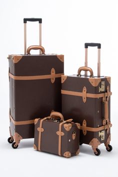 Inspired by the greatest period of traveling, the roaring 1920s, Cotrunkage’s handcrafted minimalism vintage luggage set features a dense wrap-around microfiber leather body that is complemented by heavy-duty corned stitching for maximum protection. The soft leather handle is plush to the touch and wears handsomely over time as the bronze TSA locks lighten with every adventure. We’ve also woven art print lining across the entire bag for a touch of detail and chic flair to sharpen your look. So p Vintage Suitcase Aesthetic, Luxury Luggage Sets, Travel Suitcases, House Aesthetics, Travel Luggage Set, Roaring 1920s, 3 Piece Luggage Set, Spinner Luggage Sets, Vintage Suitcases